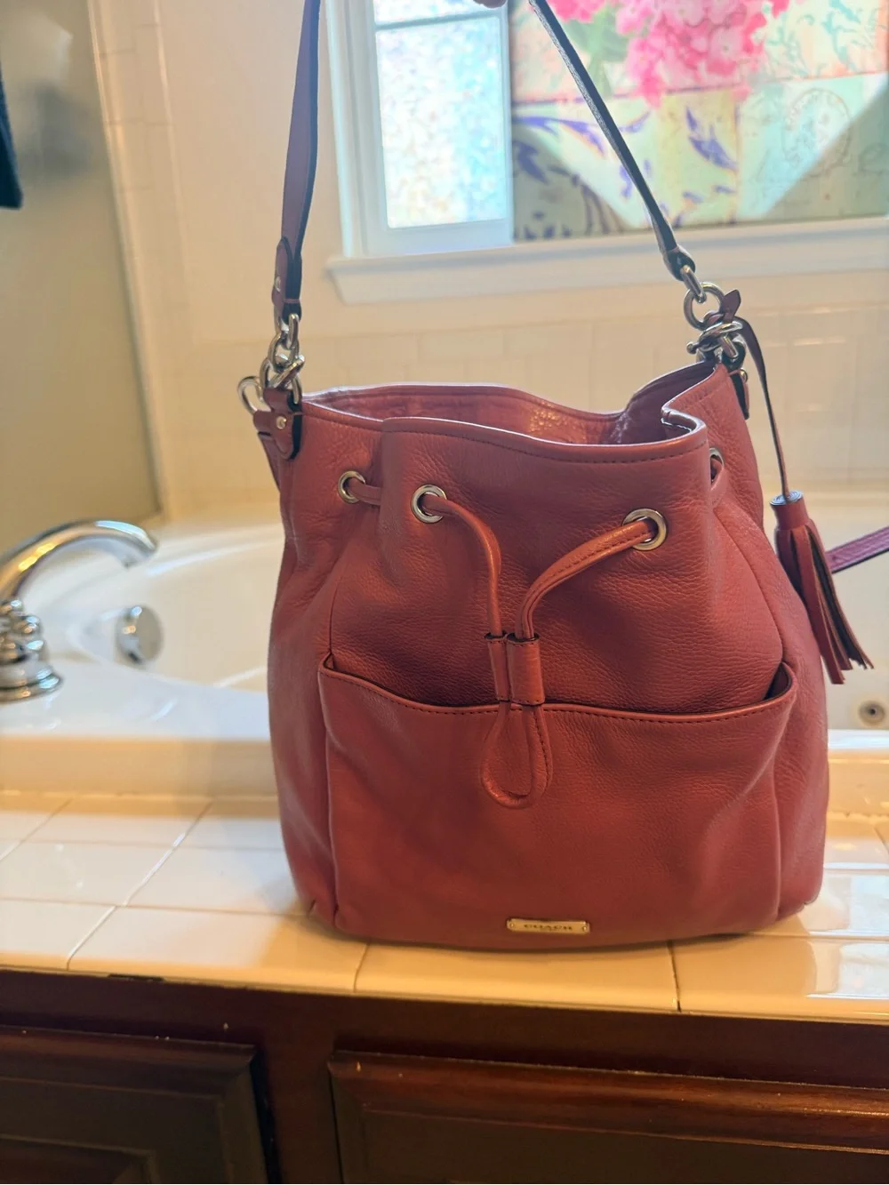 Coach Pebbled Leather Drawstring Hobo in Brick Red